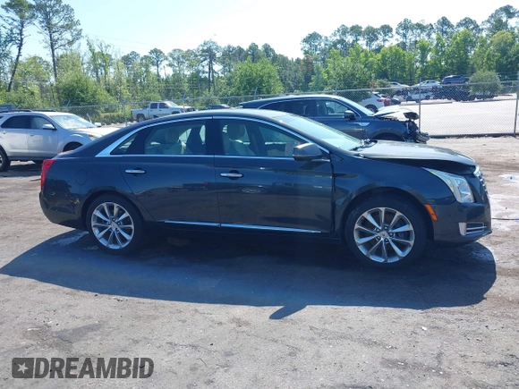 2014 Cadillac XTS Luxury z VIN 2G61M5S37E9211547, wystawiony jako IAAI lot #42373128 z przebiegiem 146 354 mil mil oraz . Historia ofert i sprzedaży dostępna na DreamBid. Obrazek 13.