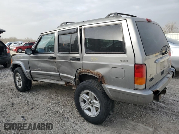 2001 Jeep Cherokee Sport z VIN 1J4FF58SX1L576572, wystawiony jako Copart lot #48982965 z przebiegiem 174 500 mil mil oraz Szkoda całkowita • Salvage title. Historia ofert i sprzedaży dostępna na DreamBid. Obrazek 2.