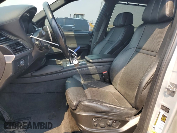 2011 BMW X5 M with VIN 5YMGY0C58BLK26357, listed as a Copart auction lot 71443774 with 116,973 mi miles and Salvage Title. Bid and sale history available at carsss.com. Image 7.