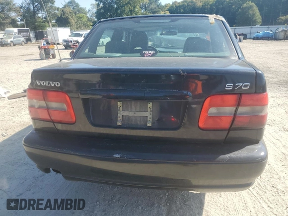 1999 Volvo S70 z VIN YV1LS55A1X1602877, wystawiony jako Copart lot #74921134 z przebiegiem 299 173 mil mil oraz Szkody całkowita. Historia ofert i sprzedaży dostępna na DreamBid. Obrazek 6.