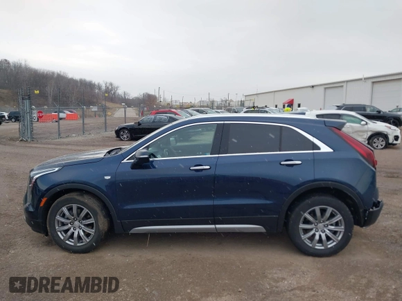 2021 Cadillac XT4 FWD Premium Luxury with VIN 1GYFZCR41MF041306, listed as a IAAI auction lot 41143747 with 53,116 mi miles. Bid and sale history available at carsss.com. Image 14.