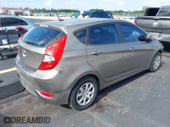 2012 Hyundai Accent GS with VIN KMHCT5AE1CU007575, listed as a IAAI auction lot 42720094 with 132,118 mi miles and . Bid and sale history available at DreamBid. Image 4.