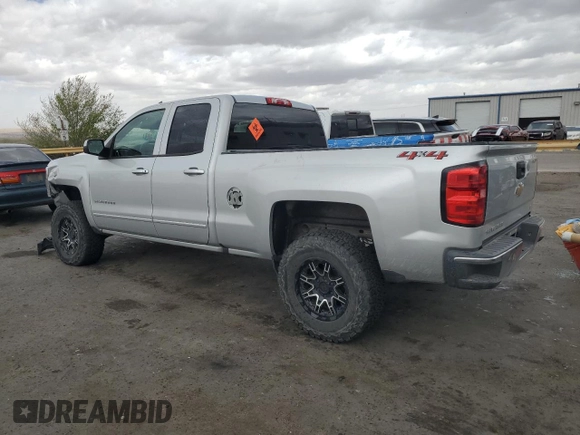 2018 Chevrolet Silverado 1500 LT with VIN 1GCVKREC2JZ180747, listed as a Copart auction lot 50405905 with 131,772 mi miles and Salvage Title. Bid and sale history available at DreamBid. Image 2.