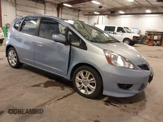 2009 Honda Fit Sport z VIN JHMGE88489S005033, wystawiony jako IAAI lot #41861124 z przebiegiem 56 148 mil mil oraz . Historia ofert i sprzedaży dostępna na DreamBid. Obrazek 1.