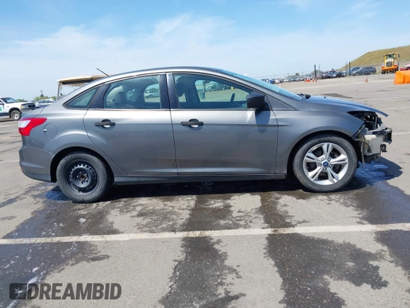 2012 Ford Focus S with VIN 1FAHP3E26CL321687, listed as a IAAI auction lot 42159853 with 139,702 mi miles and . Bid and sale history available at DreamBid. Image 14.