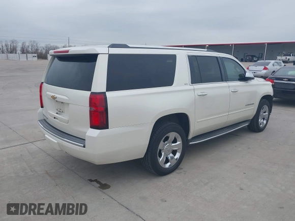 2015 Chevrolet Suburban LTZ with VIN 1GNSCKKC7FR641421, listed as a IAAI auction lot 41637137 with 139,001 mi miles and . Bid and sale history available at DreamBid. Image 4.