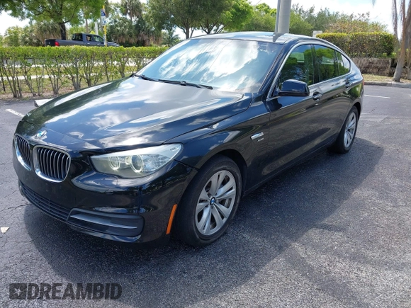 2011 BMW 5 Series GT 535i xDrive with VIN WBASP2C50BC337015, listed as a IAAI auction lot 42209500 with 136,961 mi miles. Bid and sale history available at carsss.com. Image 2.