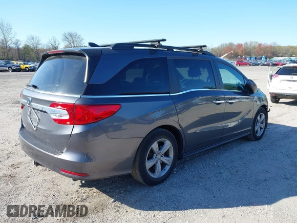 2020 Honda Odyssey EX with VIN 5FNRL6H54LB052660, listed as a IAAI auction lot 42051157 with 51,159 mi miles and . Bid and sale history available at DreamBid. Image 4.