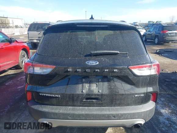 2021 Ford Escape Titanium с VIN 1FMCU9J90MUB23259, выставлен на аукционе IAAI как лот 41535706 с пробегом 100 664 миль миль и . История ставок и продаж доступна на DreamBid. Изображение 16.