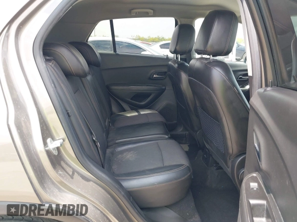 2021 Chevrolet Trax LT with VIN KL7CJLSBXMB359468, listed as a IAAI auction lot 41982149 with 199,685 mi miles and . Bid and sale history available at DreamBid. Image 8.