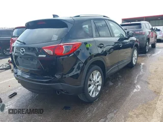 2013 Mazda CX-5 Grand Touring with VIN JM3KE4DE6D0148030, listed as a IAAI auction lot 42082947 with 119,432 mi miles and . Bid and sale history available at DreamBid. Image 4.