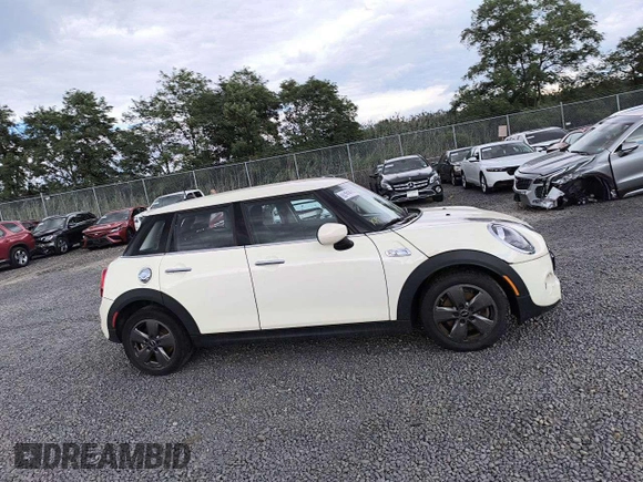 2021 MINI Hardtop 4 Door Cooper S with VIN WMWXU9C09M2P43346, listed as a Copart auction lot 68969854 with 22,394 mi miles and Salvage title. Bid and sale history available at DreamBid. Image 15.