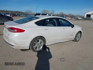 2018 Ford Fusion Hybrid SE with VIN 3FA6P0LU4JR152682, listed as a IAAI auction lot 41691305 with 142,059 mi miles. Bid and sale history available at carsss.com. Image 4.