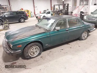 1985 Jaguar XJ with VIN SAJAV1347FC414864, listed as a IAAI auction lot 42118511 with 117,185 mi miles and . Bid and sale history available at DreamBid. Image 17.
