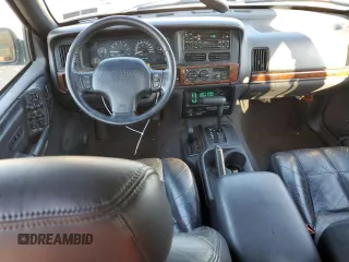 1997 Jeep Grand Cherokee Limited with VIN 1J4GZ78Y2VC728605, listed as a Copart auction lot 83342804 with 104,185 mi miles and Salvage Title. Bid and sale history available at carsss.com. Image 8.