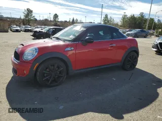 2013 MINI Coupe S with VIN WMWSX3C5XDT466095, listed as a Copart auction lot 42218315 with 134,607 mi miles and Clean Title. Bid and sale history available at DreamBid. Image 1.