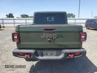 2022 Jeep Gladiator Rubicon с VIN 1C6JJTBGXNL155407, выставлен на аукционе Copart как лот 57522915 с пробегом 12 809 миль миль и Списание • Salvage title. История ставок и продаж доступна на DreamBid. Изображение 6.