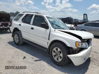 2001 Isuzu Rodeo S with VIN 4S2CK58W514313783, listed as a Copart auction lot 63038984 with 179,628 mi miles and Clean Title. Bid and sale history available at DreamBid. Image 4.