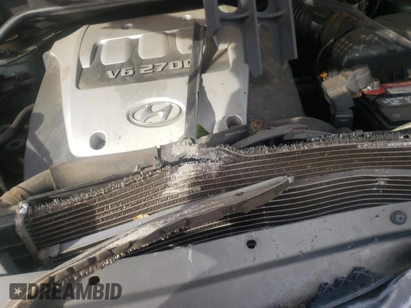 2005 Hyundai Tucson GLS with VIN KM8JN72D75U080052, listed as a Copart auction lot 75173014 with 106,479 mi miles and Salvage Title. Bid and sale history available at carsss.com. Image 12.