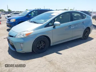 2012 Toyota Prius One z VIN JTDKN3DU8C1571310, wystawiony jako IAAI lot #42367665 z przebiegiem 152 920 mil mil oraz . Historia ofert i sprzedaży dostępna na DreamBid. Obrazek 2.