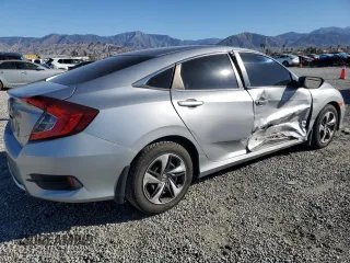 2020 Honda Civic LX with VIN 19XFC2F6XLE205068, listed as a Copart auction lot 46477215 with 58,296 mi miles and Salvage Title. Bid and sale history available at DreamBid. Image 3.