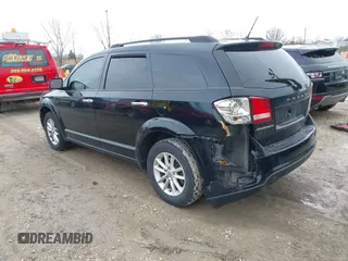 2015 Dodge Journey SXT with VIN 3C4PDCBG1FT742241, listed as a IAAI auction lot 41751280 with 163,564 mi miles. Bid and sale history available at carsss.com. Image 3.