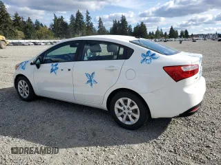 2013 Kia Rio LX with VIN KNADM4A38D6219536, listed as a Copart auction lot 72192754 with 74,307 mi miles and Salvage Title. Bid and sale history available at carsss.com. Image 2.