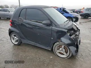2012 Smart fortwo Pure with VIN WMEEJ3BAXCK568065, listed as a Copart auction lot 84398194 with 73,989 mi miles and Clean title. Bid and sale history available at DreamBid. Image 4.
