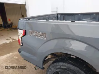 2019 Ford F-150 XL with VIN 1FTEW1EPXKKD78298, listed as a IAAI auction lot 41158508 with 76,676 mi miles and . Bid and sale history available at DreamBid. Image 19.