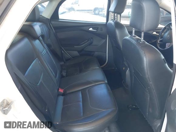2015 Ford Focus Titanium with VIN 1FADP3J28FL256155, listed as a IAAI auction lot 42350610 with 53,840 mi miles and . Bid and sale history available at DreamBid. Image 8.