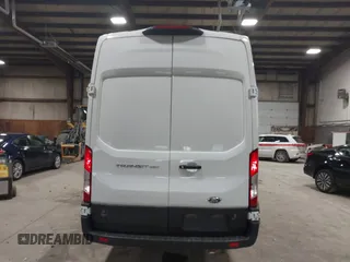 2020 Ford Transit Cargo with VIN 1FTBR3X85LKA65544, listed as a IAAI auction lot 42006800 with 55,497 mi miles and . Bid and sale history available at DreamBid. Image 17.