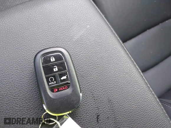 2023 Honda Civic EX-L with VIN 19XFL1H70PE014510, listed as a IAAI auction lot 42395890 with 14,163 mi miles and . Bid and sale history available at DreamBid. Image 11.