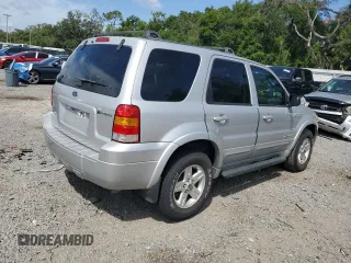 2006 Ford Escape Hybrid z VIN 1FMCU96H36KA35403, wystawiony jako Copart lot #65374705 z przebiegiem 127 689 mil mil oraz Czysty tytuł • Clean title. Historia ofert i sprzedaży dostępna na DreamBid. Obrazek 3.