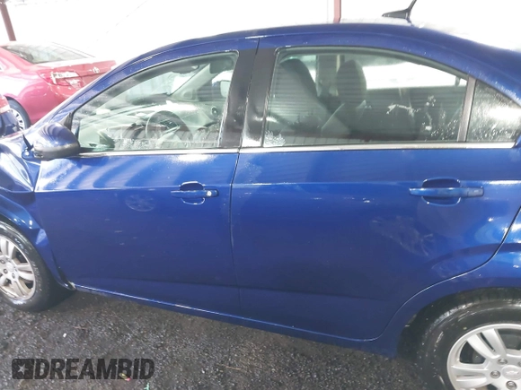 2014 Chevrolet Sonic LT with VIN 1G1JC5SG4E4136790, listed as a IAAI auction lot 37970640 with 180,252 mi miles and . Bid and sale history available at DreamBid. Image 14.