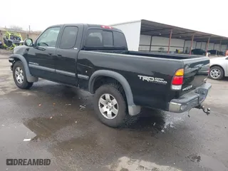 2002 Toyota Tundra SR5 with VIN 5TBBT44152S268836, listed as a IAAI auction lot 41140344 with 340,976 mi miles. Bid and sale history available at carsss.com. Image 3.