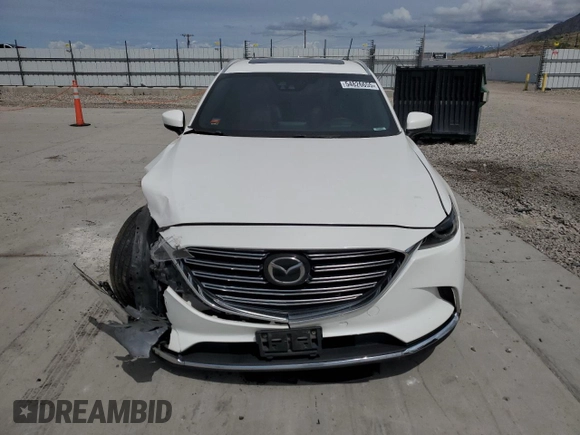 2016 Mazda CX-9 Signature with VIN JM3TCBEY7G0118322, listed as a Copart auction lot 54826655 with 123,618 mi miles and Salvage title. Bid and sale history available at DreamBid. Image 5.