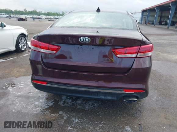 2016 Kia Optima LX with VIN 5XXGT4L32GG105361, listed as a IAAI auction lot 42066431 with 61,026 mi miles. Bid and sale history available at carsss.com. Image 16.