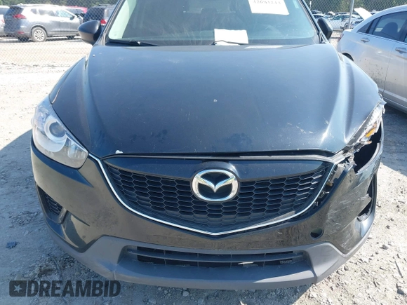 2014 Mazda CX-5 Sport z VIN JM3KE2BE2E0325715, wystawiony jako IAAI lot #42683243 z przebiegiem 262 005 mil mil oraz . Historia ofert i sprzedaży dostępna na DreamBid. Obrazek 12.