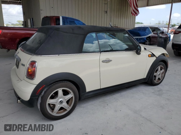 2010 MINI Convertible with VIN WMWMR3C59ATU98597, listed as a Copart auction lot 53336025 with 88,273 mi miles and Salvage Title. Bid and sale history available at DreamBid. Image 3.