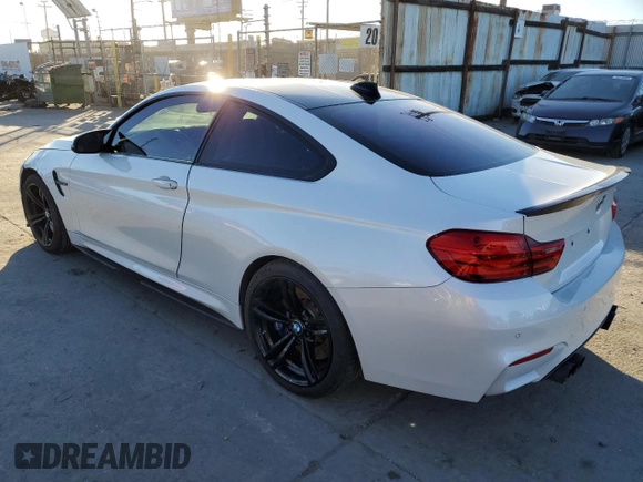 2015 BMW M4 with VIN WBS3R9C50FK331570, listed as a Copart auction lot 80739684 with 84,367 mi miles and Salvage Title. Bid and sale history available at carsss.com. Image 2.