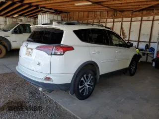 2017 Toyota RAV4 LE with VIN JTMBFREV7HJ148815, listed as a Copart auction lot 82632724 with 24,775 mi miles and Salvage Title. Bid and sale history available at DreamBid. Image 3.