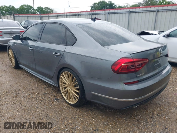 2018 Volkswagen Passat S z VIN 1VWAA7A32JC052245, wystawiony jako IAAI lot #41911668 z przebiegiem 51 634 mil mil oraz . Historia ofert i sprzedaży dostępna na DreamBid. Obrazek 3.