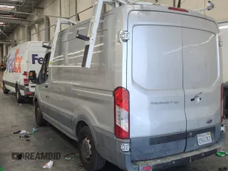 2017 Ford Transit Cargo with VIN 1FTYE1CM0HKB43622, listed as a IAAI auction lot 42670548 with 202,530 mi miles and . Bid and sale history available at DreamBid. Image 38.