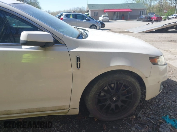 2010 Lincoln MKS w/EcoBoost with VIN 1LNHL9FT3AG611242, listed as a IAAI auction lot 42142027 with 103,758 mi miles. Bid and sale history available at carsss.com. Image 17.