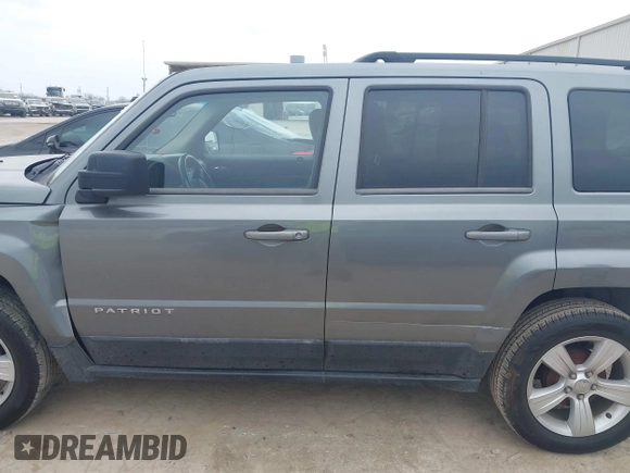 2014 Jeep Patriot Latitude with VIN 1C4NJPFAXED507693, listed as a IAAI auction lot 41701193 with 104,130 mi miles and . Bid and sale history available at DreamBid. Image 14.