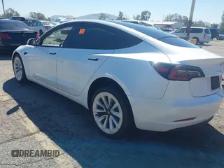 2022 Tesla Model 3 Long Range with VIN 5YJ3E1EB7NF298456, listed as a IAAI auction lot 41859304 with Not Provided miles and . Bid and sale history available at DreamBid. Image 3.