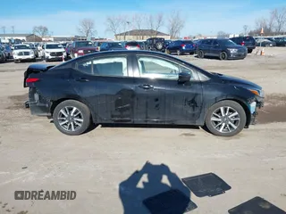 2021 Nissan Versa SV with VIN 3N1CN8EV1ML840964, listed as a IAAI auction lot 41412330 with 98,934 mi miles and . Bid and sale history available at DreamBid. Image 12.