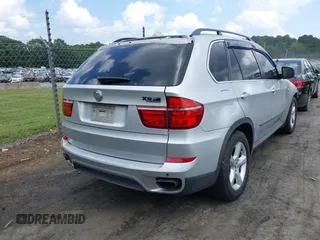 2011 BMW X5 50i with VIN 5UXZV8C55BL419654, listed as a IAAI auction lot 42752609 with 204,677 mi miles and . Bid and sale history available at DreamBid. Image 4.