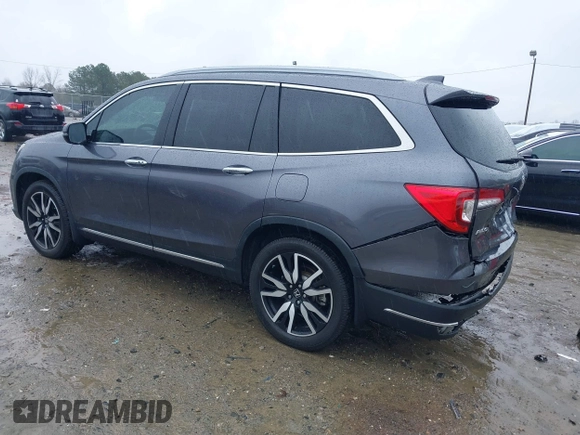 2021 Honda Pilot Touring 8-Passenger with VIN 5FNYF5H9XMB014190, listed as a IAAI auction lot 41749586 with 67,602 mi miles and . Bid and sale history available at DreamBid. Image 3.