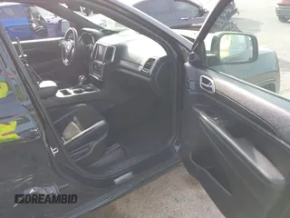 2018 Jeep Grand Cherokee Laredo E with VIN 1C4RJEAG4JC311699, listed as a IAAI auction lot 41876920 with 42,584 mi miles and . Bid and sale history available at DreamBid. Image 5.